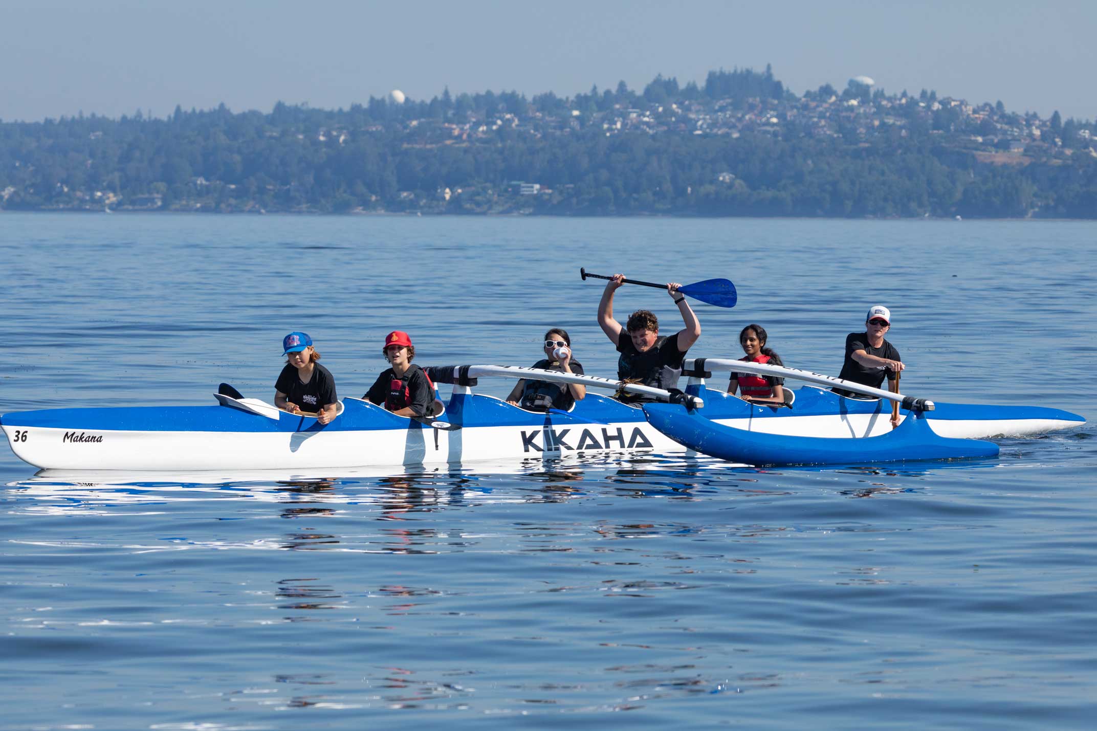 Our youth paddlers in a canoe on puget sound